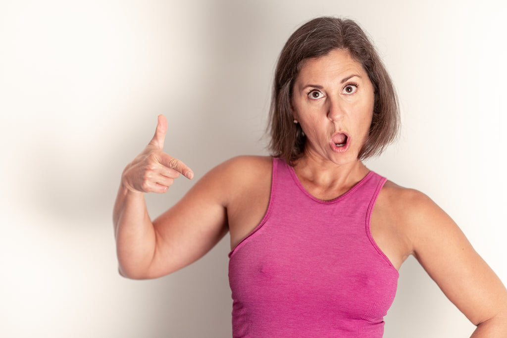 Party Hats silicone nipples worn under pink top