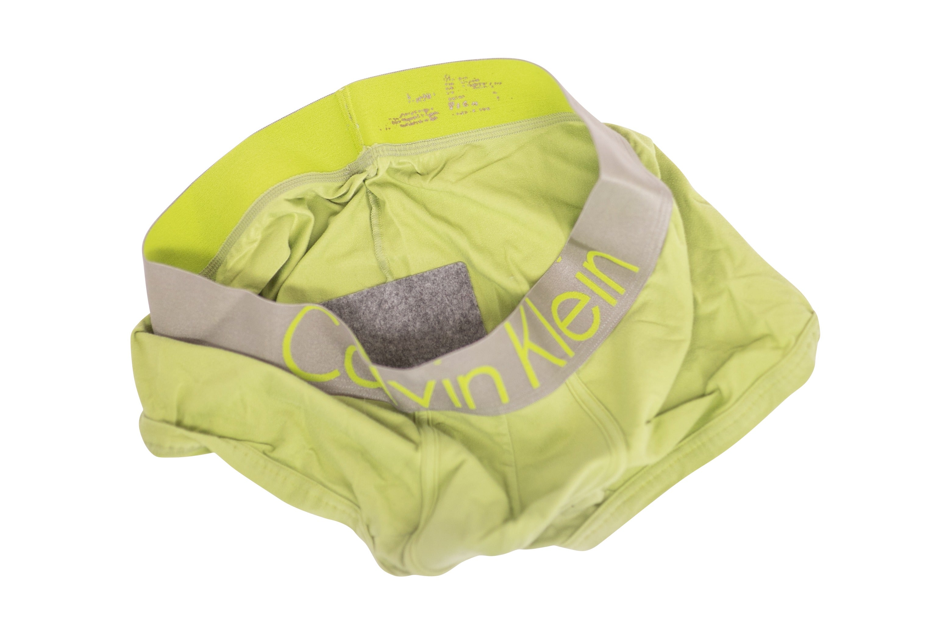 Subtle Butt disposable pad attached to green boxers